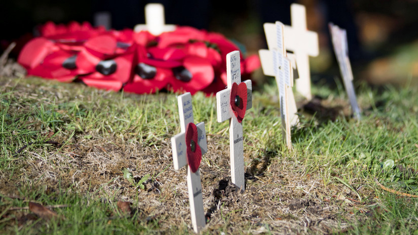 Poppies and Crosses at a Service of Remembrance. © Crown copyright